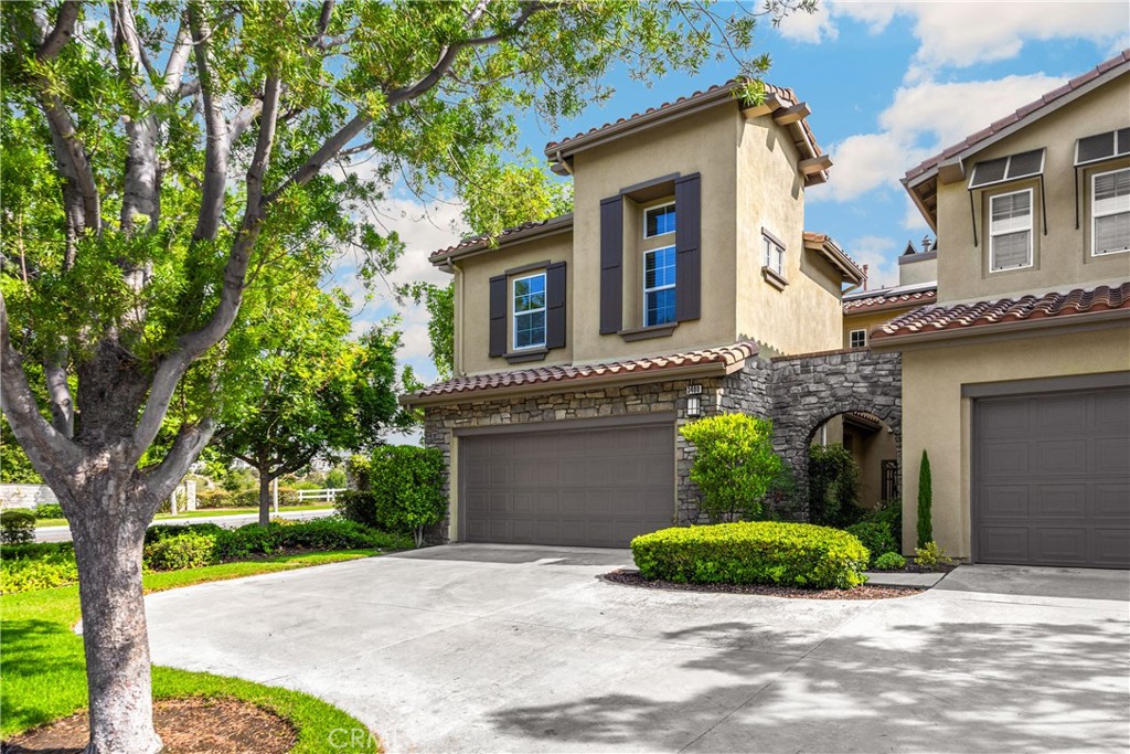 ENTERTAINERS’ DREAM | PRIME END LOT
Welcome to one of the most coveted homes in the Canterbury community—this Tuscan-inspired beauty sits on an oversized, private end lot shared with only one other residence. Boasting one of the largest backyards in the neighborhood, this thoughtfully upgraded home blends elegant design with everyday comfort.
Enter through a lush, gated courtyard into a bright, open floor plan filled with natural light and fresh breezes thanks to its unique positioning. The spacious kitchen features expansive granite countertops, brand-new double ovens and cooktop, updated cabinet faces, and a sunny breakfast nook perfect for casual dining. The kitchen seamlessly connects to both the formal dining area and the family room, creating an ideal layout for entertaining.
Upstairs, you'll find a tranquil loft library and a hallway office—perfect for homework or working from home. The expansive primary suite offers a spa-like retreat with a soaking tub, walk-in shower, dual vanities, large walk-in closet, and private balcony with ceiling fan. Two additional bedrooms, a full bath, and a convenient upstairs laundry room complete the upper level.
Interior highlights include custom lighting, crown mouldings, and a built-in media center in the family room. Enjoy peace of mind and modern efficiency with paid solar panels and battery backup, updated AC/HVAC, reverse osmosis, soft water system, Ring doorbell and floodlight, alarm system, and 220V EV charging outlet.
Host unforgettable gatherings in your expansive backyard featuring a built-in BBQ island and a shaded veranda with ceiling fan. The home also features a private driveway and a finished garage with built-in storage.
Located adjacent to Black Gold Golf Club and just a short walk to Carbon Canyon Regional Park—home to Orange County’s only grove of majestic Coastal Redwoods—this home offers direct access to nature, outdoor recreation, and award-winning schools.
The HOA provides outstanding value, covering front yard landscaping, exterior maintenance (including roof and paint), private streets, and access to a resort-style pool and spa just down the street.
Don’t miss this rare opportunity to own a home that perfectly combines elegance, functionality, and lifestyle in one of Yorba Linda’s most desirable communities.