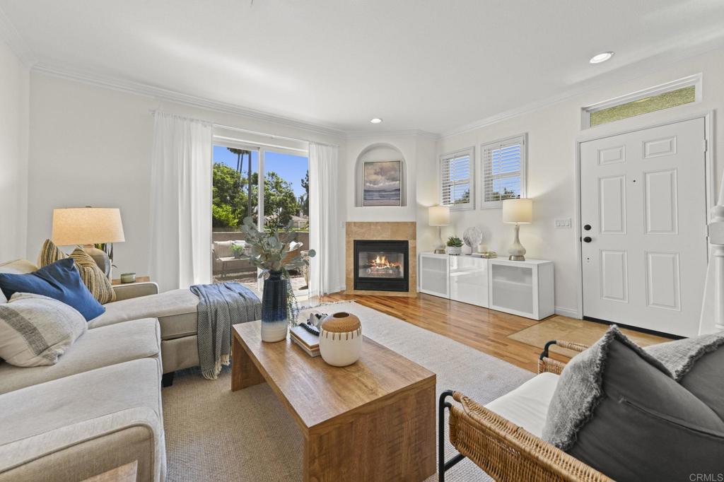 Welcome to your new home in the heart of Carlsbad! This rarely available 3-bedroom, 2.5-bath corner-unit townhome is tucked within the highly sought-after Valencia community of Rancho Carrillo. Freshly painted and filled with natural light, the home boasts an open and airy floorplan with real wood floors throughout both levels. The bright white kitchen features brand-new quartz countertops and opens seamlessly to the living and dining areas—perfect for both everyday living and entertaining. Enjoy the convenience of an attached 2-car garage with plenty of space for parking and storage, and stay cool year-round with a brand-new AC system. Step outside to your own sun-drenched patio, or take advantage of fantastic community amenities just steps away—including a sparkling saltwater pool, spa, BBQ area, and exclusive access to the Rancho Carrillo Swim Center. Reserved for residents and their guests, the Swim Center features a 57-foot year-round heated pool and spa. The neighborhood is full of charm and activity—don’t miss nearby Leo Carrillo Ranch Historic Park, where peacocks freely roam, or explore scenic Rancho Carrillo trails that are perfect for walking, running, cycling + pet friendly. Families also love nearby Alga Norte Park with its sports fields, skate park, playgrounds, and community swim center. Best of all, this home is just minutes from Bressi Ranch shopping and dining—including Carlsbad’s only Trader Joe’s—plus top-rated schools, sandy beaches, and major tech employers. Priced below recent sales, this move-in-ready home is a rare opportunity in one of North County’s most desirable neighborhoods.