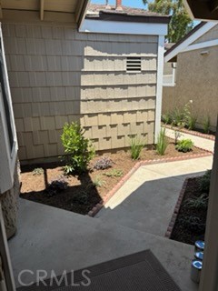 ONE LEVEL located on private and quiet area on single loaded street. New Kitchen with new sink, dishwasher, stove, microwave and cabinetry. New laminate flooring in kitchen, living room and both bedrooms. Very desirable open floor plan with vaulted ceilings in the living room and master bedroom. The kitchen features lots of cabinets and storage space with small dining area. Skylight in living room and cozy fireplace. Spacious 2 car ATTACHED garage with washer/dryer hook ups and plenty of built in cabinetry. Small patio off living room. Home features a security system that tenant may activate at their own cost. Walking distance to Woodbridge Village Shopping Center, public transportation and Eastshore Elementary. Come enjoy all the Woodbridge amenities including North and South Lake.