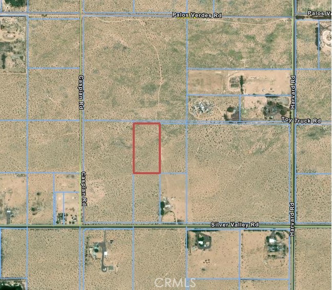 Nearly 5 Acres of land north of I40 in Newberry Springs. Lot sits in an area of large residential properties and agricultural areas. Many possible uses. Buyer and buyer's agents to perform all necessary due diligence as to potential uses or restrictions.