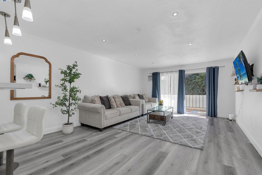 Welcome to this spacious and updated 2-bedroom, 2-bath condo located in one of Castro Valley’s most desirable neighborhoods. This well-maintained unit features a bright and open floor plan with stylish recessed lighting, modern waterproof vinyl flooring, and in-unit washer/dryer for your convenience.  The refreshed kitchen boasts sleek quartz countertops, stainless steel appliances, and contemporary refaced cabinetry—perfect for both everyday living and entertaining. Enjoy your morning coffee or evening unwind on the large private balcony, ideally facing northeast to stay cool in the summer and shielded from bay winds in the winter.  Additional highlights include two dedicated parking spaces, extra storage. Located within the sought-after Castro Valley School District, and close to Lake Chabot, BART, major freeways, and local shops and dining, this home offers the perfect blend of comfort and convenience.  Whether you're a first-time buyer or an investor looking for a prime rental opportunity, this condo checks all the boxes. Don’t miss your chance to own in this fantastic community—schedule your showing today!