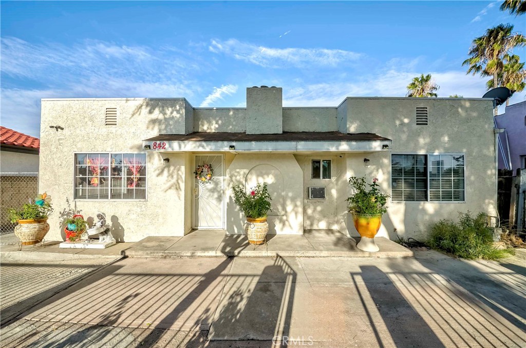 Welcome to charming single-level home in the heart of Anaheim featuring 3-bedroom, 1-bath main home PLUS a spacious detached 1-bedroom, 1-bath unit with a separate entrance — ideal for extended family, guests, rental income, or a private home office! This cozy and bright house is tastefully upgraded with new countertop and stylish tile backflash kitchen and offers fully fenced front yard, long driveway with plenty of parking and a large storage shed, providing excellent potential with approved plans for 499 sqft. Prime location close to downtown activities, parks, Disneyland, Angel Stadium, Anaheim Packing District with easy access to 5, 91, 57 freeways. Don't miss out this hidden gem with tons of potentials!