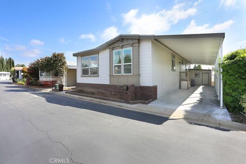 Photo of 129 La Ronda, Tustin, CA 92780 (MLS # OC26095183)