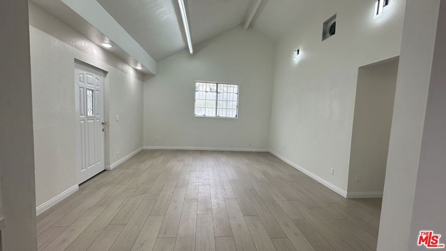 Nestled in the heart of East Hollywood, this charming 4 bedroom, 3 bathroom home perfectly balances privacy and convenience. Tucked behind a gated fence and surrounded by lush greenery, it offers a serene retreat just moments from the vibrant energy of Sunset Boulevard's top restaurants, cafs, and shops.Step inside to a space that feels bright, fresh, and open where soaring vaulted ceilings and abundant natural light create an immediate sense of airiness and comfort. The home's thoughtful blend of classic charm and modern upgrades enhances both style and livability, making every room inviting and functional.With excellent walkability, strong public transit connections, and a lively, eclectic neighborhood atmosphere, including the cultural richness of nearby Little Armenia, this location is both dynamic and community oriented.