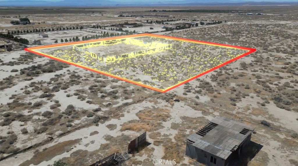 Amazing opportunity to own 2.5 acres of flat land in the City of Lancaster. Explore the potential of this vacant land and enjoy the serenity of the desert with breathtaking mountain views. This land offers privacy while still being close to local amenities. It has been surveyed and conveniently features power lines nearby along with a water well on the property. Zoned LCA2. Contact Me No for More Information.
