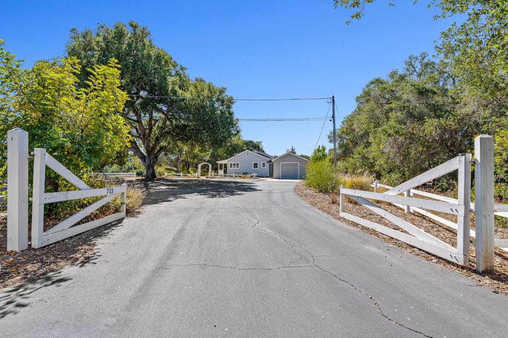 Discover a charming 2-bedroom, 2-bathroom home situated in a serene area off Hwy 68. This residence boasts a generous 2 acre lot, offering ample space for outdoor enjoyment. The kitchen is thoughtfully equipped with essential appliances, such as a microwave, oven range with gas, refrigerator and garbage disposal. It features a tiled countertop, perfect for casual cooking and baking sessions. The dining area is designed as an eat-in kitchen, providing a cozy space for family meals. The home features a variety of flooring throughout, including hardwood, laminate, and tile, enhancing the overall aesthetic and comfort. For those cooler nights, a fireplace adds warmth and ambiance to the living space. Practical amenities include a laundry area located in the utility room, complete with a washer and dryer. The property falls within the Washington Union Elementary School District. Additional conveniences include forced air heating and ceiling fans for cooling. With 1 car garage space, this home is both inviting and functional. Don't miss this opportunity to create cherished memories in Salinas. With SB9, the property may be able to be sub-divided...buyer to investigate.