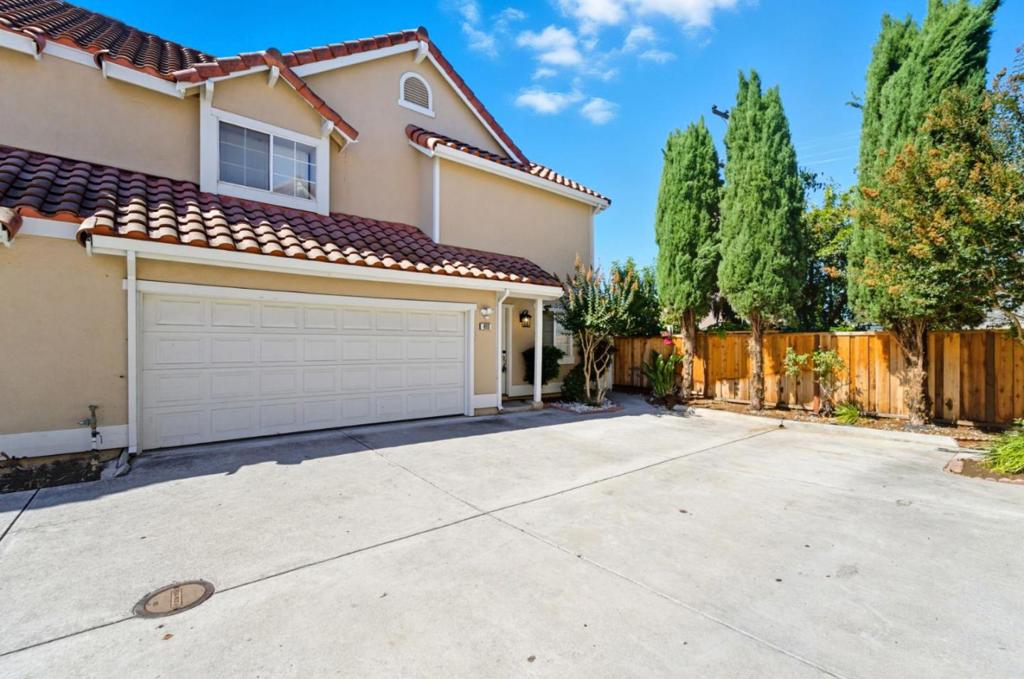 Affordable single-family home featuring 3 bedrooms, 2.5 bathrooms, and 1,328 sq ft of well-designed living space. The kitchen includes a cozy eat-in area and easy-to-maintain laminate flooring. Relax by the fireplace in the living room, and enjoy year-round comfort with central AC and ceiling fans. The backyard is cute, easy to maintain, and highlighted by fruit trees, perfect for relaxing or entertaining. A two-car garage provides ample parking and storage. This San Jose gem is the perfect blend of comfort and convenience ready to welcome you home.
