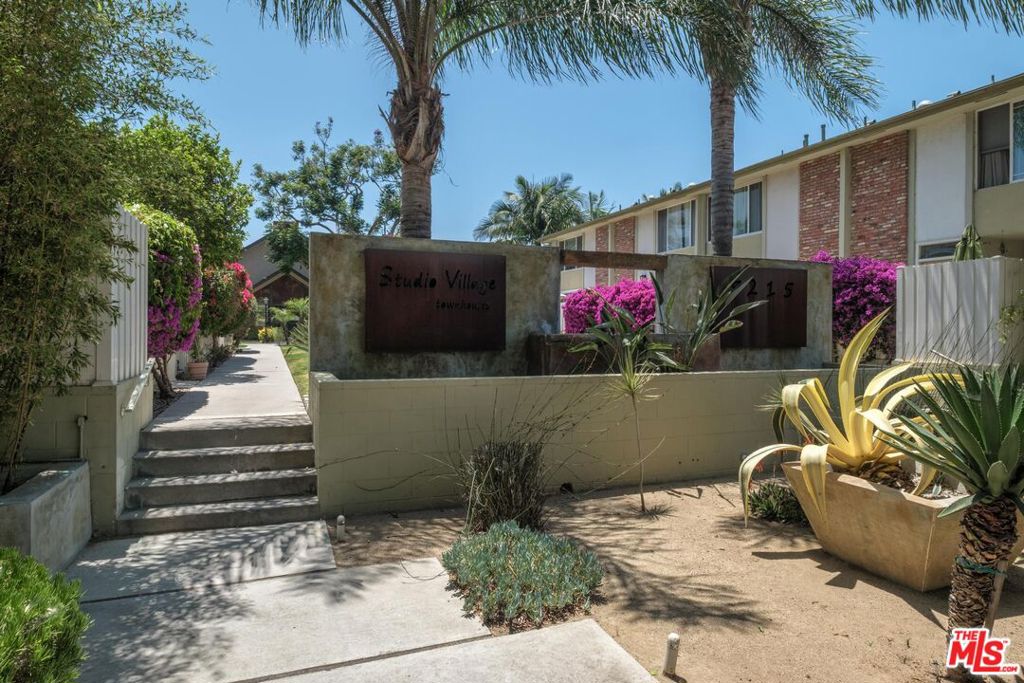 Welcome to this charming, well-kept "Studio Village" tri-level interior unit with 2-bedroom, 1.25-bathroom in the heart of Culver City! This inviting home is one of the best-priced townhomes in the area and offers an attached two-car garage with a versatile downstairs space perfect for a home office, gym, studio, or additional storage, along with a convenient laundry area with a brand-new hot water heater. Upstairs on the main level, you'll find a bright, open layout featuring a living room, dedicated dining area, guest bathroom, and a kitchen with granite countertops, white cabinets, built-in appliances, a cozy breakfast nook, and a counter bar for entertaining. Off the living room is a sliding glass door that opens to a welcoming front patio perfect for relaxing or enjoying your morning coffee. On the upper level, the spacious primary bedroom includes an extended reading or office nook, a unique standalone shower for a quick morning shower, and a generous walk-in closet for easy changing and extra storage. Across the hallway is a nicely sized second bedroom and a large full bathroom with a tub. Enjoy year-round comfort with central air and heating. Step outside and discover the many community amenities: a clubhouse, sparkling pool, wading pool, putting green, and children's play area offering fun, and relaxation. All this and more in a prime Culver City location, close to shops, fantastic dining, and everything this vibrant community has to offer!