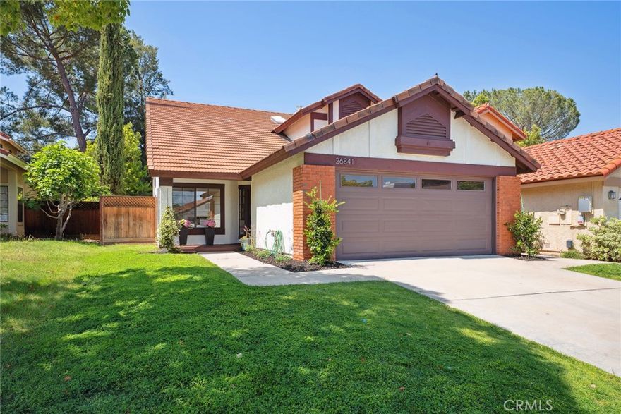 Located on a charming culdesac, walking distance to the best schools and parks in Calabasas this Deer Springs home is move in ready with brand new updates. Beautiful White Oak Wide Plank Flooring throughout this home feels bright and airy with high ceilings and an abundance of windows bringing in all the natural light. The open concept kitchen features stainless steel appliances including a brand new refrigerator, new stove/oven, new dishwasher and microwave. Custom cabinetry with island peninsula perfect for entertaining or casual dining opens to the family room with cozy fireplace. Freshly painted inside and out in a warm white and flawless espresso trim, accented with rich cocoa cabinetry lends to any aesthetic. A first level office can also be the fourth bedroom adjacent to a full bath with tub/shower. Upstairs you’ll find a primary suite with vaulted ceilings, recessed lighting, large walk in closet and a primary bathroom with double vanity sinks and separate water closet, tub/shower. Two additional bedrooms have large closets, recessed lighting and share a hallway bathroom. The lovely backyard is very private and features a large grassy area and covered patio. Walk to Grape Arbor Park, De Anza Recreation Center, Erewhon Market and A E Wright Middle School. Located within LVUSD, a short drive to Malibu, Pepperdine University, The Commons of Calabasas, this neighborhood is the perfect location.