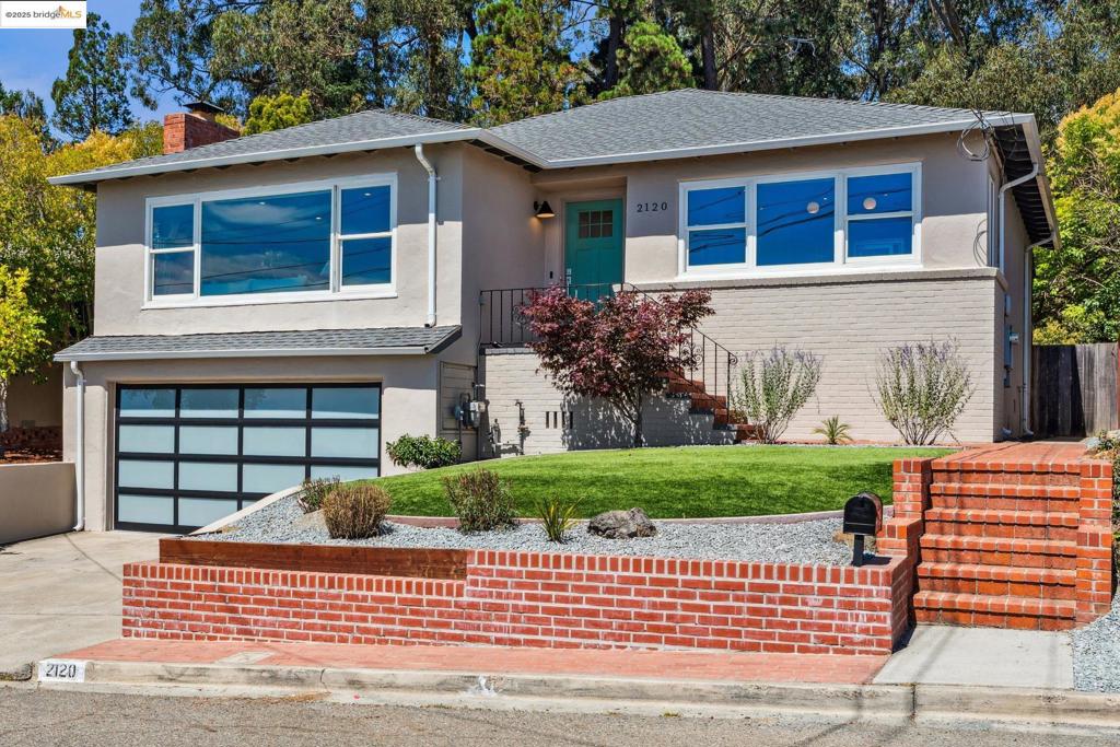 Imagine owning a home of your own. Look no further and make this dream your reality at 2120 Braemar Rd! This spacious, light filled home features an updated kitchen with high-end stainless steel appliances, stone countertops, radiant heated floors, and a breakfast bar. Get a peak of the bay when lounging in the living room near a cozy fireplace. Enjoy entertaining on the deck overlooking the back yard and gardens. When it's time to turn in for the evening, relax in the beautifully designed primary suite with an over-sized shower, skylight, and heated floors. Located on a quiet cul-de-sac in the Oakmore neighborhood with easy access to major freeways and the Glenview, Oakmore, and Montclair commercial districts, this home can make your dream come true.