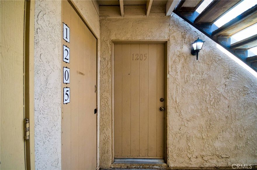 Lower level unit with 2 bedroom/ 1 Full bath. Upgraded kitchen and bath. New Laminated wooden floor installed in bedrooms. Close to parking and near pool area. Open floorplan with private patio. Spacious bedrooms with large closets and plenty of storage. Cinnamon Tree amenities include pool, spa, barbeque area, club house and laundry. Conveniently located across from the Placentia Civic Center, Police Station and Public Library. Alta Vista Country CLub, parks, schools, shopping and 57/91 freeways are all nearby.