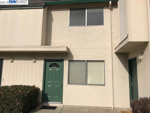 Great unit, with new carpet, new paint, clean and ready for a new owner. Neutral & Light, open living room and a dining area in the kitchen. There is a half bath downstairs, full bath and laundry area upstairs. Unit is located in the back of the complex with a sliding glass door to the private patio area and new fence all around. Great for a 1st time homeowner or an investor. Washer/Dryer and Refrigerator is included. Home is centrally located with a security gate, pool and maintenance free - no stress living.