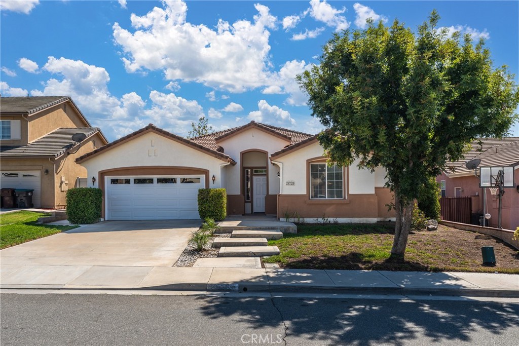 What is Homeowners Association (HOA), because there is none in this neighborhood; NO HOA!
Step right into a truly move-in ready home, featuring fresh paint inside and out and shampooed carpets! Did I mention LOW TAXES and absolutely NO HOA—a massive financial advantage.
The moment you enter, you are welcomed by soaring vaulted ceilings and an abundance of natural light that flows over elegant porcelain tile flooring. The open-concept design centers around the show-stopping gourmet kitchen and great room, the perfect heart for the home. The kitchen is meticulously appointed with a center island that has granite, beautiful cabinetry, including a gas range, microwave, dishwasher, and sink. Plus, enjoy peace of mind with a brand new AC unit installed this year.
Relax or host in the spacious living room, featuring a cozy fireplace and seamless access to the well-manicured, low-maintenance backyard containing two citrus trees and a Tuff Shed to store your tools. The private Primary Suite is a dedicated sanctuary, offering direct access to the backyard, a spa-like jacuzzi tub, separate shower, dual vanities, and essential walk-in closets; one for each person. Don't forget that the toilet in the primary bedroom has a privacy door.
This home is designed for maximum function and privacy, perfect for families or guests:
Bedroom Privacy: Two bedrooms share a convenient dual sinks in the full bathroom, while the third bedroom features its own dedicated ensuite bathroom—the ideal dual suite setup. Finally Practicality: A spacious laundry room can double as a well-appointed mudroom with ample storage between the garage and living space. We can't forget the indoor-outdoor California Lifestyle, extend your living space with the relaxing back patio, a serene covered sitting area that overlooks the easy-to-manage, low-maintenance backyard. From outside and in the pictures you will see the condition of this wonderful tile roof giving you peace of mind.
Location, Location, Location: Centrally located for ultimate convenience! Enjoy quick access to shopping, dining, schools, and the 215 Freeway.