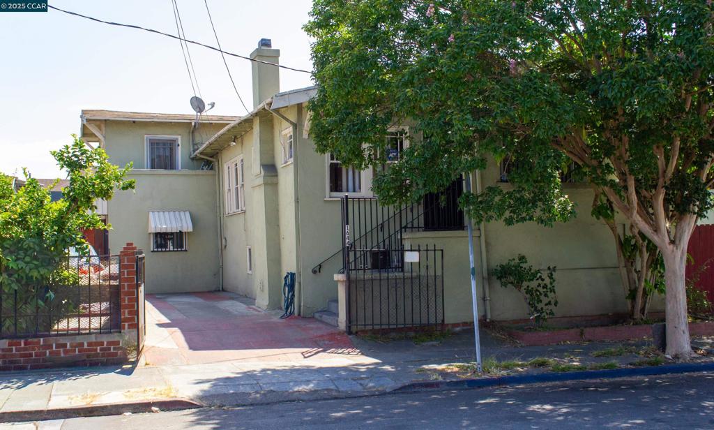 Charming 1925 split-level home in Oakland’s vibrant Fruitvale District, offering endless potential for investors or families ready to bring new life to this property. The main home features 3 bedrooms, 1 bath, a spacious living room with wood-burning fireplace, formal dining with built-ins, wood trim, and a kitchen with breakfast nook. Upstairs you’ll find 2 bedrooms with hardwood floors, a full bath, and ample hallway storage. The basement includes a nonconforming 2-bed/1-bath unit with separate entrance—ideal for extended family or possible ADU use (buyer to verify). While the home needs significant renovation, it’s a rare opportunity to restore 1920s charm while adding value. Located near Fruitvale BART, AC Transit, Fruitvale Village, schools, and a vibrant community of shops and restaurants. An excellent chance to invest in one of Oakland’s most dynamic neighborhoods!