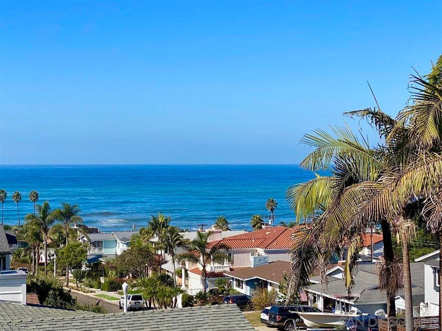 For the buyer seeking protected panoramic ocean views, a refined coastal lifestyle, and the perfect balance of craftsmanship, comfort, and connection to nature and community—this is home! And it’s the only one like it. At the crest of the hill in South Sunset Cliffs, this exceptional coastal Craftsman showcases breathtaking, protected views of the Pacific, coastline, and magical sunsets—just two blocks from the surf. Featuring 3+ bedrooms and 3 bathrooms, the home highlights dramatic open-beam ceilings, skylights, a striking fireplace, and exquisite use of brick, wood, tile, & granite.The primary suite is a private sanctuary with sweeping views that inspire from sunrise to sunset. The chef’s kitchen features a large island that opens seamlessly to the dining area, perfect for gatherings.Outdoor living shines with a stunning tiled pool, multiple private patios, a sauna, and expansive decking that define the ultimate indoor-outdoor lifestyle—ideal for entertaining or simply savoring sunsets in total privacy. Set on an oversized corner lot, the property offers ample space for additional vehicles, recreational toys, or the potential to add an ADU. Located in the highly desirable Azure Vista subdivision, this rare gem blends timeless craftsmanship, an unbeatable location, and walkability—just steps from Sunset Cliffs Natural Park, Jensen’s, Peet’s Coffee, & minutes to the bay and yacht clubs. With protected ocean views, paid solar panels, a Tesla Powerwall system, and every amenity at your doorstep, you’ll feel like you’re on vacation every day—without ever leaving the Peninsula