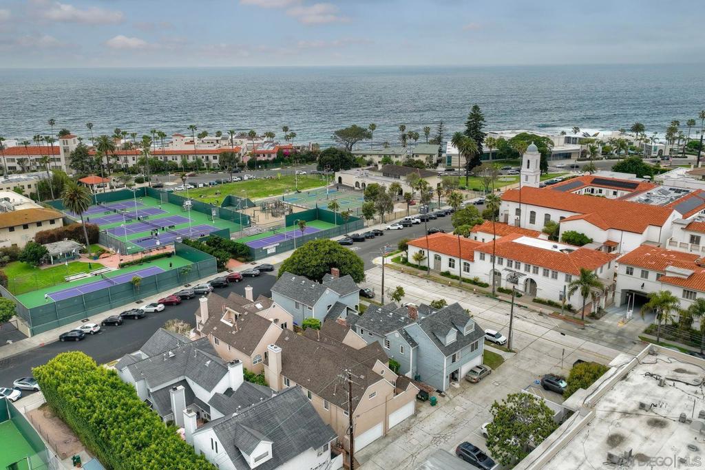 Welcome to 7635 Draper Avenue—an elegant 2-bed, 2-bath condo in the heart of La Jolla Village, just 0.2 miles from the ocean. This spacious 1,830 sq ft residence lives like a detached home with no shared walls, no neighbors above, and an attached two-car garage. Soaring vaulted ceilings and abundant natural light create an airy, open feel throughout. The oversized primary suite features a generous closet space and spa-like bath, offering a serene retreat. An open-concept layout connects the expansive living, dining, and kitchen areas—perfect for entertaining or relaxing. Enjoy unbeatable walkability with La Jolla Cove just 4 minutes away, and top attractions like the Children’s Pool, Prospect Street’s dining and galleries, and George’s at the Cove all within 0.3 miles. You're directly across from The Bishop’s School, La Jolla Rec Center, the Tennis Club, and the Museum of Contemporary Art. Whether you're seeking full-time coastal living or a luxurious second home, this rare offering delivers the best of La Jolla’s vibrant village lifestyle—private, peaceful, and just steps from everything. Welcome to 7635 Draper Avenue—an elegant 2-bed, 2-bath condo in the heart of La Jolla Village, just 0.2 miles from the ocean. This spacious 1,830 sq ft residence lives like a detached home with no shared walls, no neighbors above, and an attached two-car garage. Soaring vaulted ceilings and abundant natural light create an airy, open feel throughout. The oversized primary suite features a generous closet space and spa-like bath, offering a serene retreat. An open-concept layout connects the expansive living, dining, and kitchen areas—perfect for entertaining or relaxing. Enjoy unbeatable walkability with La Jolla Cove just 4 minutes away, and top attractions like the Children’s Pool, Prospect Street’s dining and galleries, and George’s at the Cove all within 0.3 miles. You're directly across from The Bishop’s School, La Jolla Rec Center, the Tennis Club, and the Museum of Contemporary Art. Whether you're seeking full-time coastal living or a luxurious second home, this rare offering delivers the best of La Jolla’s vibrant village lifestyle—private, peaceful, and just steps from everything.
