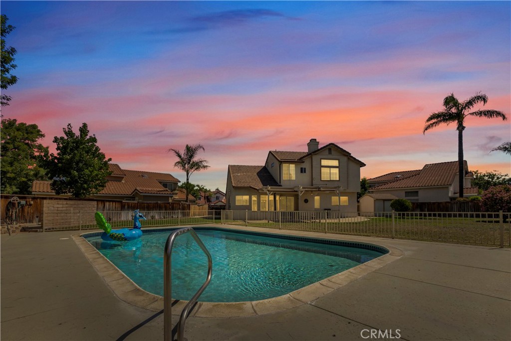 Welcome to your dream home, a cozy 4-bedroom, 3-bathroom retreat nestled in a friendly cul-de-sac. This charming home boasts a spacious park-like backyard with a sparkling pool, perfect for entertaining or relaxing under the stars. The inviting kitchen features a delightful breakfast nook by a bay window with serene pool views, ideal for morning coffee or casual meals. The home includes a convenient downstairs bedroom with a full bathroom, perfect for guests or multi-generational living, and an indoor laundry room for added practicality. Upstairs, two bedrooms share a functional Jack-and-Jill bathroom, ideal for siblings or guests along with the primary retreat with walk in closet. A 3-car garage provides ample space for vehicles and storage.
This thoughtfully designed home blends warmth and functionality, creating an ideal setting for memories. Located in a peaceful, community-oriented neighborhood, it offers both privacy and a sense of belonging. Don’t miss the chance to make this heartwarming house your forever home.