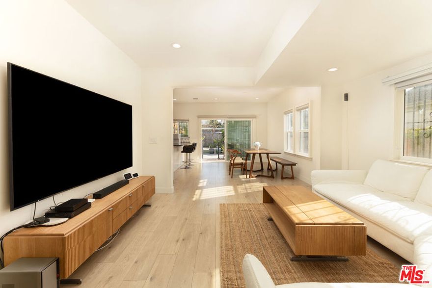 Spectacularly recently remodeled, this elegant residence sits on an expansive 8,507 sq. ft. flat lot, offering rare privacy and exceptional future potential. The spacious backyard provides ample room to explore ADU or expansion opportunities.Surrounded by mature, lush landscaping, the property offers a peaceful garden sanctuaryan uncommon retreat from the pace of city life. Thoughtfully designed outdoor spaces, including a well-maintained garden area, create a calming environment ideal for quiet mornings, relaxation, or intimate gatherings. The interior features a warm, sophisticated layout that blends timeless architectural character with modern comfort.Ideally located near major transportation routes and everyday conveniences, yet tucked away on a quiet residential street within a well-established, sought-after community.Situated in the Country Club Park Historic Preservation Overlay Zone (HPOZ), this 1919 architectural gem presents a rare opportunity to own a home offering space, serenity, and long-term value in the heart of Los Angeles.