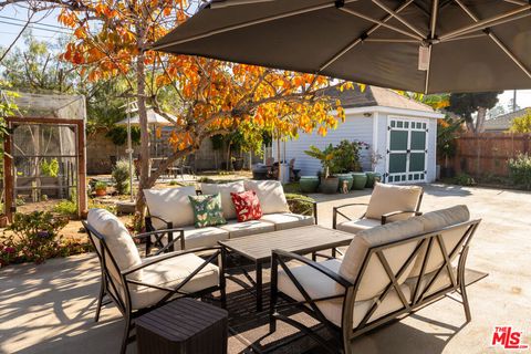 Photo of 1026 Westchester Place, Los Angeles, CA 90019 (MLS # 25629235)