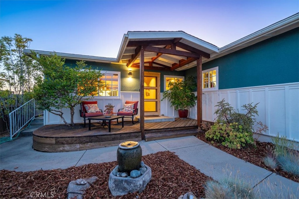 Custom Comfort Meets Coastal Charm. Welcome to this warm and inviting 3-bedroom, 2-bath home located in a quiet cul-de-sac just around the corner from Ocean View Elementary. Enjoy a peak of the ocean and beautiful sunsets from your kitchen window and back porch. With 1,522 sq. ft. of beautifully upgraded living space—including a finished sunroom—on a spacious 7,841 sq. ft. lot, this home is packed with thoughtful features inside and out. From the moment you arrive, you’ll notice the charm—from the cozy front porch with a step made of reclaimed Pismo Beach Pier wood, to the welcoming curb appeal. Step inside to find custom-built cabinetry, solid core doors, tongue and groove ceilings, and a gorgeous soapstone island in the kitchen. Two mini-split heating and air systems and ceiling fans throughout ensure year-round comfort, while newer windows and sliding glass doors bring in abundant natural light. The primary suite opens to a beautiful patio and features an upgraded bath with a luxurious rain shower head. The finished sunroom adds flexible space for a home office, playroom, or bonus living area. Out back, the yard was designed for easy entertaining and laid-back living—complete with cobblestone paver patio, artificial turf, fire pit, and a fully irrigated landscape. Enjoy your own backyard orchard with a clementine tree, Meyer lemon, lime, two seedless orange trees, and two avocado trees. There's also a storage shed, RV/boat parking, and even an EV outlet in the garage for your electric vehicle. With a newer roof (just 7 years old), newer exterior paint, and a new water heater, this home is truly move-in ready. Ideally located near schools, shopping, restaurants, and more—this is a rare opportunity to own a beautifully updated, one-of-a-kind home in a prime coastal neighborhood.