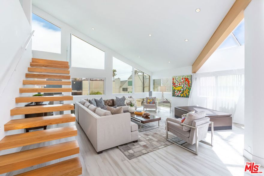 This Penthouse is a one-of-a-kind, ultra-chic & exquisitely brilliant space that is California beach living at its best! There is barely a square inch left untouched by improvements galore in this superlative gem. Airy, bright and 50 feet from the beach, this breath-taking masterpiece will enchant you with its intelligently sophisticated design. Each of the 2 bedrooms has ample closet space while the loft space serves as the perfect home office, entering lounge or 3rd bedroom. Additional features of this home include chef's kitchen, spa-style bathrooms, in-unit laundry, 2 garage parking spaces, storage units, guest parking and two outdoor private patios that will take your breath away. This condo is adjacent to the beach, the marina, close to LAX, shopping, restaurants, the 405, bike path and parks. Sunset views on the beach await you at this tranquil California dream home. THIS PROPERTY IS ALSO LISTED FOR SALE AT $2,500,000.