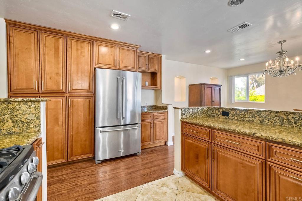 Welcome to your coastal retreat! Discover the perfect blend of comfort, style, and outdoor living in this beautifully remodeled home, ideally located on a quiet, tree-lined street in charming Carlsbad walking distance to Kelly Elementary. This spacious three-bedroom, one-bath residence offers an inviting open layout that’s perfect for relaxing or entertaining. Step outside to your backyard oasis — a generous, beautifully landscaped space featuring a sparkling pool and spa, a built-in barbecue, and a comfortable outdoor dining area where you can enjoy warm California evenings with family and friends. The home includes an attached two-car garage, a recently updated interior with modern finishes, and plenty of natural light throughout. Enjoy the benefits of solar panels, keeping your electricity costs low, and rest easy knowing pool maintenance and gardening are covered by the owner. Located close to Carlsbad’s gorgeous beaches, shopping, and dining, this home offers both convenience and a serene lifestyle.