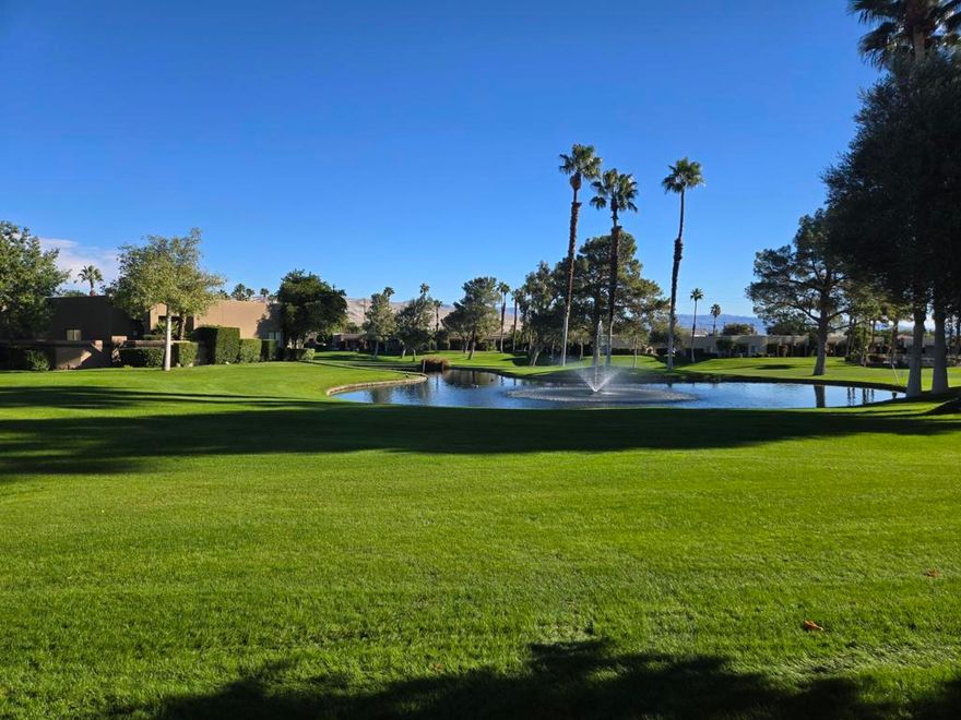 This well located two-bedroom Toltec model, end unit condominium offers exceptional east-facing views of Vista 1, a pond with fountain, and the surrounding mountains. Situated on a favorite street within Desert Princess, this residence provides convenient access to the fitness center, tennis and pickleball courts, driving range, and clubhouse. Interior features include tile and Pergo flooring, as well as newer washer/dryer, HVAC system, and hot water heater. This meticulously maintained end unit presents a refined oasis in the desert.Land Lease extended to 2069 (a BIG savings!) and Monthly Ground Rent is $178.06.HOA DUES INCLUDE: 2 DVR or HD Cable boxes and service, High Speed Internet, grounds maintained to your door by HOA ground maintenance crew, outside pest control when requested, outside water, (you pay only for inside water). Gated community with 24 hour guard gate access, membership to Health and Fitness Center, Tennis, Bocce Ball, Pickleball. Discounts and preferred tee-times for owners at the Desert Princess 27-hole PGA Championship golf course, no initiation fees, rated among the best in the valley by GOLF DIGEST. This quiet community is away from the noise yet minutes from everything that is in Palm Springs; restaurants, shopping, casinos, an international airport, the Tramway, Art Museum, Theaters, and the Street Fair.