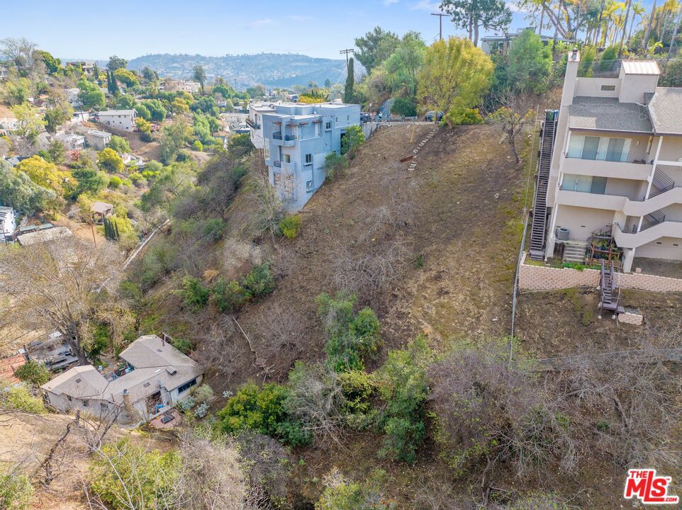 A fantastic opportunity to build in the highly desirable Mount Washington neighborhood! This 6,100 sq. ft. downslope lot on Quail Drive is perfectly positioned just steps from Mount Washington Elementary School, making it an ideal spot for those seeking a prime location in a serene hillside setting. Whether you're a developer or looking to create your own custom home, this lot offers incredible potential. Plus, two additional lots just a few doors down are also available - see MLS #25500770 for details. Seller has some reports available. Don't miss your chance to own in one of Northeast LA's most sought-after communities.