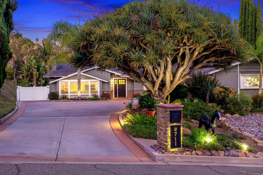 Location, location, location! Tucked away on a quiet cul-de-sac in the highly coveted Mt. Helix/Horizon Hills neighborhood, this single-level stunner offers the perfect blend of comfort, style, and resort living. From the moment you arrive, you’ll be captivated by the lush landscape and the show-stopping Red Dragon tree gracing the front yard. Inside, abundant natural light, and a beautifully open floorplan create a warm yet elevated feel. The remodeled chef’s kitchen is a centerpiece with newer stainless steel appliances, a walk-in pantry, and a spacious island that flows seamlessly into both the living and family rooms. The inviting family room is the ultimate gathering spot with its custom bar and walls of windows framing views of the backyard paradise. Step outside and discover your own resort: a sparkling newly plastered pool surrounded by travertine tile, a refurbished deck with shaded seating, built-in BBQ, turf, avocado trees to die for, vinyl fencing, and a storage shed—designed for entertaining and year-round enjoyment. Recent upgrades include fresh interior and exterior paint, newer flooring and carpet, windows, blinds, doors, and a new roof—plus paid solar for maximum efficiency. Walking distance to Fuerte Elementary School, and close to shopping, dining, and freeway access, this is more than just a home—it’s a rare Horizon Hills retreat where every day feels like a vacation. First time on the market, custom built and lovingly cared for by the original family—now ready to be passed down to you. Don’t miss the chance to make it yours! Could this be your home?