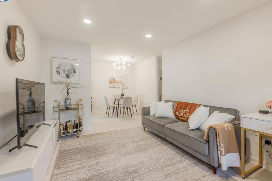 Enjoy modern living in its prime, beautifully updated lower-end unit, featuring new luxury vinyl plank (LVP) flooring. This home welcomes you to enter a bright, & airy living space. A sleek kitchen with white shaker cabinetry, gray countertops, and stainless steel appliances. Great serene views from primary bedroom, while a private porch. perfect for morning coffee or fresh air. You also get 1 designated covered parking spot and plenty guest parking. This Peninsula Place community includes the following amenities to benefit from, Crisp community pool & spa, fitness center, tennis courts, clubhouse, & more. Close to YouTube, Bayhill Shopping Center, Tanforan Mall, parks, restaurants, SFO, BART, CalTrain, and major freeways. Come take a look before its gone!