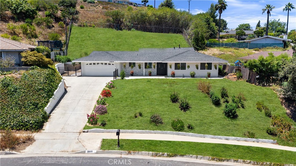 Welcome to this beautifully renovated single-story home in the heart of Hacienda Heights! This charming pool home features 3 bedrooms and 2 bathrooms, with brand-new flooring, a modern kitchen, and tastefully updated bathrooms giving the entire space a fresh, like new feel. The elevated front yard offers both privacy and scenic views. Inside, the open-concept living and dining areas are filled with natural light and provide a clear view of the backyard. The gourmet kitchen includes a walk-in pantry, perfect for any home chef. The spacious primary bedroom features two closets and direct access to the backyard retreat. Step outside to a large, private backyard with a sparkling pool and breathtaking views ideal for relaxing or entertaining. Sitting on an expansive lot of over 21,000 sq/ft., this property offers endless potential for gardening, custom landscaping, or even adding an ADU. Located in a sought after neighborhood with top rated schools, the home also offers easy access to shopping, dining, parks, and major freeways. Don’t miss this move-in ready gem in one of the most desirable areas of Hacienda Heights!