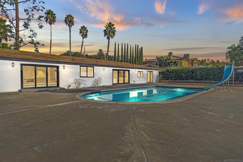 This beautifully remodeled single-story home in Poway offers 2,950 square feet of thoughtfully designed living space, featuring four spacious bedrooms and three full bathrooms. Step inside to an expansive, open-concept layout showcasing a chefs dream kitchen with upgraded appliances, ample counter space, generous storage, and stunning views of the sparkling pool. This home is perfect for entertaining, with a spacious living room, neutral tones, and stylish fixtures throughout. Newer windows and sliding doors invite an abundance of natural light, creating a warm and inviting atmosphere. The large driveway has space for an RV or Boat. Feasibility studies and reports are available for adding an ADU on the property, offering exciting potential for expansion. The seller has never occupied the property and has very limited knowledge of property condition or history. All measurements are approximate. Buyer's and Buyer's Broker/Agent should verify measurements and complete thorough inspections and investigations prior to Close of Escrow to satisfy themselves with the current condition of the property. Buyer(s) to verify and approve all data, reports, records, inspections, permits, MLS, HOA, if applicable and all information pertaining to the property prior to removal of contingencies. All contracts/offers are subject to seller approval and any offers or counteroffers by seller are not binding unless the entire agreement is ratified by all parties.