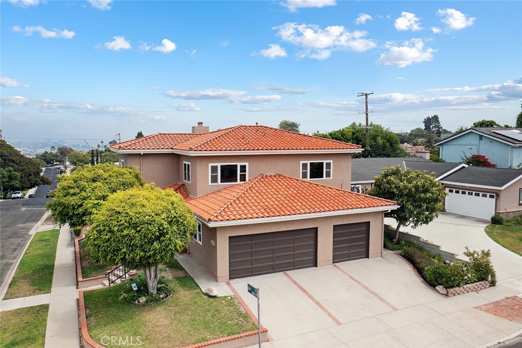 A MUST HAVE RAREITY! REALLY - NOTHING LIKE IT! Stunning San Pedro home in upper Vista del Oro, this beauty is situated on a large, flat corner lot with Sweeping Harbor Views, just steps from Averill Park. Lovingly held by the same family for decades, almost every inch of this home has been newly renovated, presenting a Modern, Contemporary Living Space. The Spacious Ground Level features 3 Bedrooms and 2 Bathrooms. The generous Primary Suite, with wet bar - presents a Unique Opportunity for Future Utilization as a kitchenette for an In-Law Suite. Upstairs, find a large, renovated Kitchen and Den/Formal Dining Room, with abundant storage. An inviting Living Room and Bedroom (could be an office) share access to a Breezy Patio and Panoramic Harbor Vistas. A Fifth Bedroom and Bathroom complete the upper level. The home boasts ample storage and a 3-Car Garage. Don’t miss this Exceptional Opportunity to be one of the very few homeowners to call this coveted San Pedro neighborhood your own!