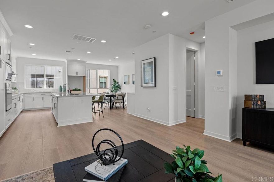 Modern Coastal Living – Live the ultimate Carlsbad lifestyle in this beautifully upgraded 4-bedroom, 3.5-bathroom home offering 1994 sq ft of light-filled, open-concept living in a prime location. The gourmet kitchen features Wolf appliances, quartz countertops, and shaker-style soft-close cabinetry, blending luxury and function. A spacious layout includes a private downstairs bedroom with en-suite bath, ideal for guests or multi-gen living. Additional upgrades include owned solar and a 2-car garage with EV charger. Enjoy incredible access to the outdoors — walk to Agua Hedionda Lagoon for paddleboarding, kayaking, or swimming, and hop on your e-bike to catch waves at Tamarack Beach, just minutes away. The community offers resort-style amenities including a pool, hot tub, dog park, and playground, and you’re surrounded by top-rated Carlsbad schools, coastal trails, shopping, dining, and more. Luxury finishes, unbeatable location, and a true coastal lifestyle — Welcome home to 2579 Elderberry Ln.