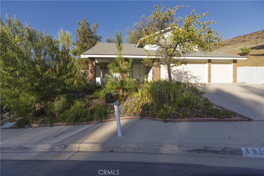 Now Offered Under $5,000/Month – An Exceptional Lease Opportunity in Thousand Oaks
Tucked away at the end of a quiet cul-de-sac, this uniquely private Thousand Oaks residence offers a rare opportunity to live on an expansive lot surrounded by nature—without a neighbor on either side or behind you. With peaceful views, room to roam, and starry skies overhead, this is the perfect way to explore the lifestyle of the Conejo Valley before making a long-term commitment.
Inside, you'll find a well-maintained executive home with a grand double-door entry, soaring ceilings, and a sweeping staircase that makes a stunning first impression. The formal living room features cathedral ceilings, while the open-concept family room at the rear of the home is anchored by a dramatic floor-to-ceiling stone fireplace and stylish wood-look tile flooring.
The adjacent kitchen is bright and modern, equipped with white cabinetry, Crystalline countertops, and stainless steel appliances—ideal for both everyday living and entertaining. Upstairs, four spacious bedrooms include a generous primary suite with walk-in closet, dual-sink vanity, and soaking tub.
Additional features include a three-car garage with laundry and backyard access, plus dedicated RV or boat parking. The home is also equipped with a Nest Learning Thermostat and a two-year-old HVAC system for efficient year-round comfort.
Step outside to your private outdoor retreat—enhanced with synthetic grass, new drought-tolerant landscaping, and framed by mature trees and scenic hillsides. Whether you're relaxing, entertaining, or just enjoying the quiet, this property offers a lifestyle that’s hard to match.
All this in a premier location with top-rated schools, unmatched local amenities, and clear night skies you can actually see.