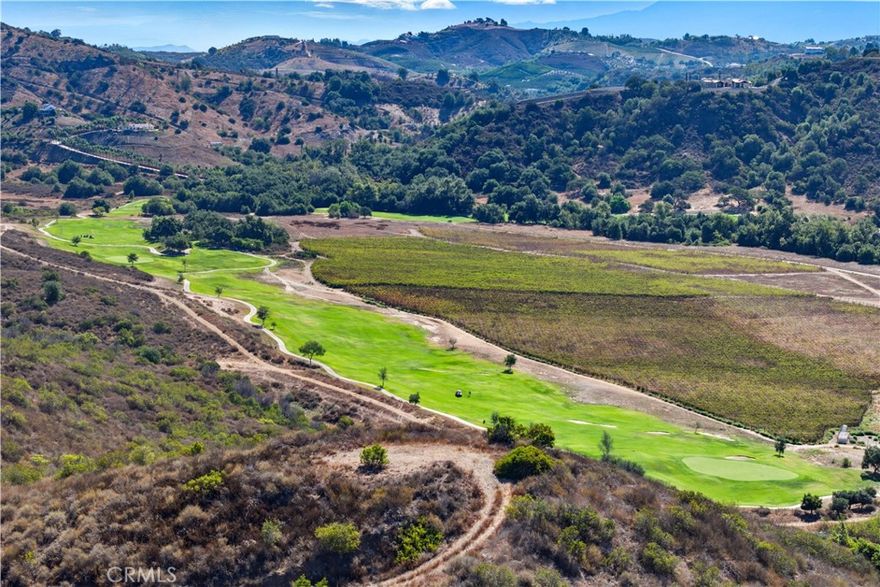 Stunning 5.5-Acre View Lot Overlooking Cross Creek Golf Course – De Luz, Temecula! Welcome to your dream homesite or investment opportunity nestled in the scenic hills of De Luz, a sought-after enclave in the Temecula area. This expansive 5.5-acre corner lot boasts a rough-graded pad perfectly positioned to take full advantage of breathtaking, panoramic views of the surrounding mountains, lush valleys, and the prestigious Cross Creek Golf Course below. Whether you're envisioning a luxurious estate, boutique agricultural venture, or a peaceful retreat surrounded by nature, this property offers unmatched potential. The land is bathed in natural beauty and serenity, with rolling terrain and wide-open skies that create a truly majestic setting. With its highly desirable location and usable layout, the possibilities are endless—from vineyards and groves to equestrian use or simply building your dream home with views that inspire. Buyer and buyer’s agent to conduct their own due diligence and verify all details with the city or county, including zoning, building requirements, utility access, and exact property boundaries. Buyer is solely responsible for confirming allowable uses, permitting, and development options. Don’t miss this rare opportunity to own a piece of paradise in one of Southern California’s most picturesque areas!