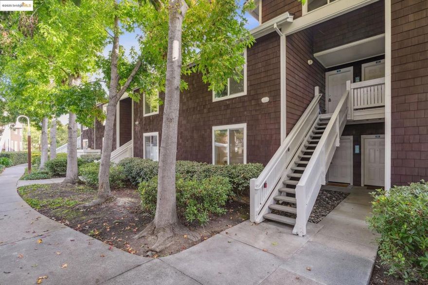 Experience serene coastal living in this beautifully updated ground-level 1-bedroom, 1-bath condo in the desirable Marina Bay community, with beautiful water views. This move-in-ready home features a modern kitchen with marble countertops, stylish light fixtures, and a spacious open layout that fills with natural light. Enjoy a cozy fireplace with a custom wood-looking wall design and a bathroom enhanced with elegant wood-style finishes around the tub. Step outside to your private patio, where tranquil water views create the perfect setting for morning coffee or evening relaxation.   The entire interior was completely remodeled, including luxury waterproof vinyl plank flooring extended throughout, a brand-new kitchen, a new electrical system, and plumbing systems, for added comfort and reliability.  The gated community offers resort-style amenities, including two heated pools, spas, a fitness center, clubhouse, tennis and pickleball courts, EV charging stations, and lush landscaped paths along the Bay Trail. Conveniently located near the Richmond Ferry, BART, and major freeways, this home combines comfort, style, and accessibility. The perfect blend of coastal and city living.