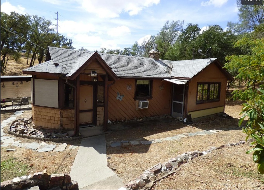 What a great opportunity for a person who wants to make this home their own. This fixer has a cellar, detached shed, covered patio, SFWP water, natural gas, and electric service. This large lot is private and has open space on all sides. Located a short distance from shopping and restaurants. Even though it's a fixer, you could live here while improvements are made.