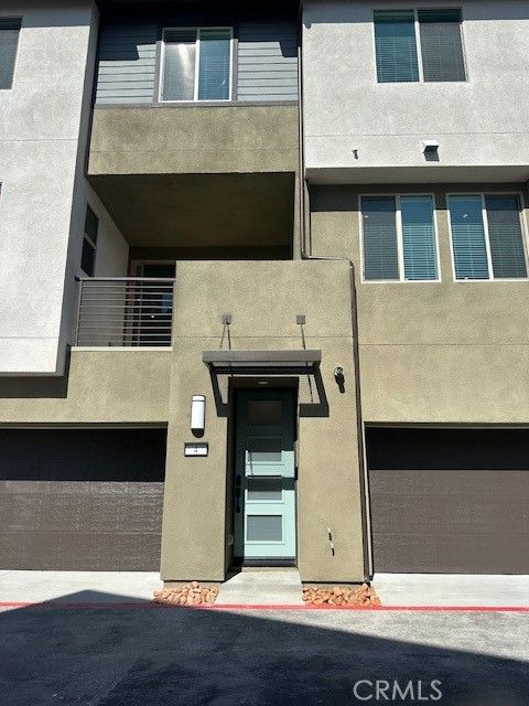 Photo of 1553 Lima Way #4 Way, Placentia, CA 92870 (MLS # OC26042186)