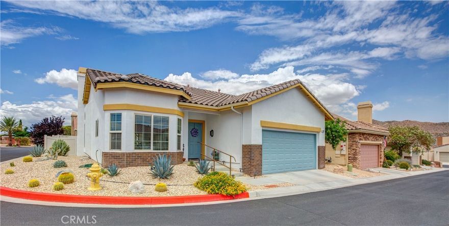 Located In The Beautiful Desert Vista Village 55+ Gated Community. At Least One Tenant Must Be 55+ and Spouse Can Be As Young As 48! This Bright & Spacious 3 Bedroom - 2 Bathroom Unfurnished Home Is In Move In Condition And Located On A Premiere Corner Interior Lot With Mountain Views. It Is Conveniently Located Just A Few Steps To The Clubhouse. Newer Exterior Paint & Trim. This Property Is Beautifully Landscaped With Inviting Desert Plants and Flowers. Flooring Is Ceramic Tile With A Special Glass Decorative Insert Thru-Out. The Sunny Kitchen Boasts Corian Counter Tops, Stainless Steel Appliances And A Lovely Bay Style Window. Plenty Of Cabinet Space For Storage And A Cozy Breakfast Nook. The Large, Open Living Room Has A Gas Fireplace, Cathedral Ceilings And A Lovely Palladian Style Window. The Primary Bedroom Has A Walk-In Closet and En-Suite Bathroom With Dual Sinks. Backyard Has A Shady Covered Patio And Is Completely Fenced For Privacy. Central Heat & A/C. Water Heater & LED Lighting And Newer Garage Door Opener. Clubhouse Has Abundance Of Amenities Waiting For You To Enjoy. It's Just 30 Minutes To Palm Springs, Joshua Tree Nat. Park, The 29 Palms Marine Base & Tortoise Rock Casino. Close to Shopping, Restaurants, Medical. So Much To Appreciate. Ready For You To Move In As Early As Monday, October 27, 2025!