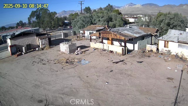 Welcome to 6601 and 6561 Locust Ave in Inyokern, CA — a highly desirable diamond in the rough offering incredible potential for investors, business owners, or anyone looking to live and work on the same property. These two parcels are being sold together. This mixed-use opportunity features a street-facing storefront with excellent visibility, ideal for a retail shop, office, or small business. Behind the commercial space are two separate residential units, each with its own entrance, perfect for generating rental income or accommodating extended family. While the property could use some TLC, it boasts solid bones and endless possibilities for customization or redevelopment. Whether you're looking to restore and rent, run your own business, or build long-term equity, this versatile property is full of promise. Don’t miss out on this rare find in the heart of Inyokern — schedule a showing today and unlock its full potential.