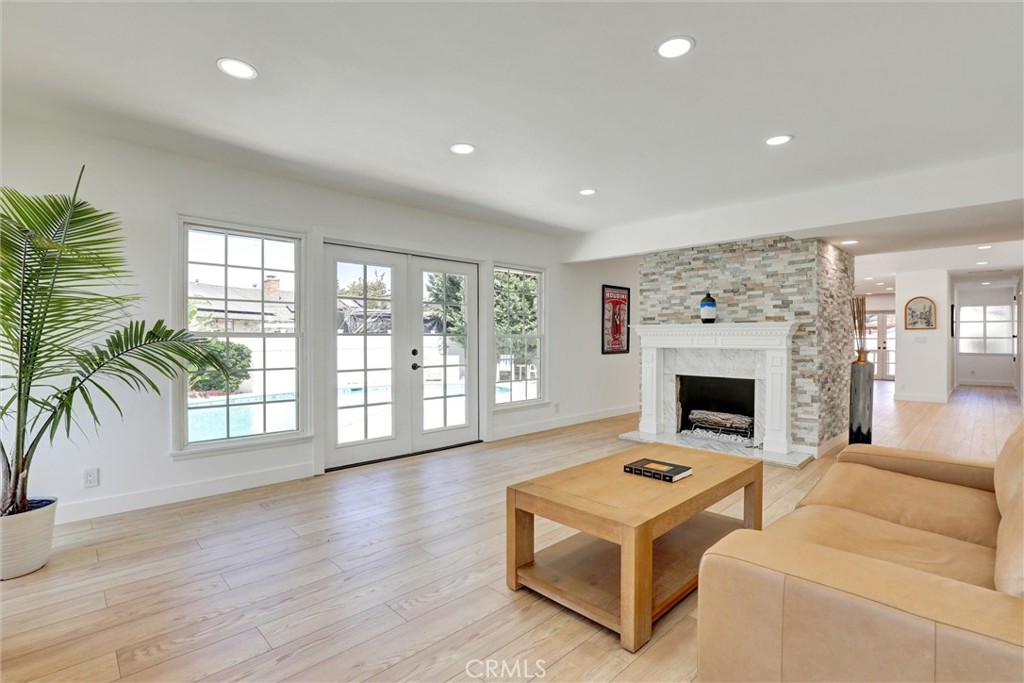 WELCOME TO ORANGE TREE! This gorgeous, turnkey remodeled Pool Home sits in the very heart of North Tustin. You'll love every inch of this exquisite homage to suburban life. The sparkling pool beckons through multiple French doors, while the dual fireplace and spacious kitchen with its extravagant cabinetry warms your heart. Three generously sized bedrooms, two full baths, and a shimmering like-new pool, surrounded by mature fruit trees including tangerine, avocado, nectarine, lemon, Valencia orange, and blood orange, all snugly situated in the excellent Tustin Unified School District.
Less than a mile from Historic Old Town Tustin, walking distance to the world-famous Crab Cooker restaurant. Don't wait, don't hesitate, come to see it for yourself because this wonderful gem of a home won't last long.