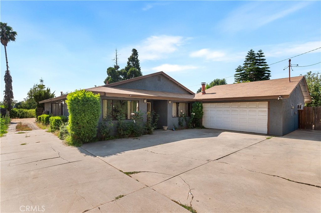 Welcome to an incredible opportunity for buyers looking for space, potential, and value! Sitting on a massive half-acre lot, this property offers significantly more land than most homes in the area, providing endless possibilities for expansion, entertaining, or creating your dream backyard oasis. A unique feature of this property is the converted garage, ideal for multigenerational living, guest accommodations, or potential rental income with the proper updates. This home does need some improvements, making it perfect for buyers looking to customize and build equity. Conveniently located near popular destinations like Downtown Covina, Porto’s Bakery, Plaza West Covina, and numerous restaurants along Citrus Ave, you’ll enjoy a great balance of space and city convenience. Whether you're an investor or a buyer with vision, this is a rare chance to own a large lot in Covina. Act fast—homes with this much potential don’t last long!