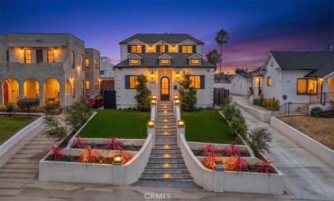 Photo of 1358 S Ridgeley DR, Los Angeles, CA 90019 (MLS # RS26179067)