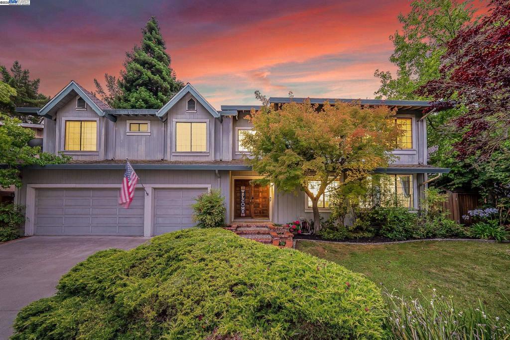 Tucked away on a quiet court in the desirable Thomas Ranch community, this spacious 5-bed, 3-bath home sits on an over 1/4-acre private lot and offers 2,868 sq ft of flexible living space. The unique layout features main living areas upstairs, complete with vaulted ceilings, skylights, a cozy wood-burning fireplace, and an open family room with a built-in display unit. A large bar creates an excellent space for entertaining or casual meals. The oversized primary suite includes a walk-in closet and a soaking tub. The upstairs laundry area provides added pantry/storage for convenience. Downstairs features a private bonus bedroom/office with a separate entrance and full bath—perfect for guests, teens, or multi-generational living. A large under-stair storage area is currently used as a wine cellar—a creative and functional use of space. Step outside to a peaceful backyard retreat with mature fruit trees (peach, lemon, and lime), birdsong, and plenty of room to relax, garden, or entertain. Exceptionally clean and move-in ready, yet priced to allow future updates. Thomas Ranch includes a private park, scenic trails, top-rated schools, and easy freeway access. Visit 22Cobblestone.com for details.