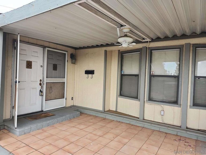 Discover this spacious manufactured home featuring a two-car detached garage. The interior boasts a mix of hardwood and carpeted floors. The kitchen is finished with classic Formica countertops. This home includes original electrical and plumbing systems, and has a roof and HVAC system that have been well-maintained over the years. This property is free of foundation issues. It's a wonderful opportunity for comfortable living.