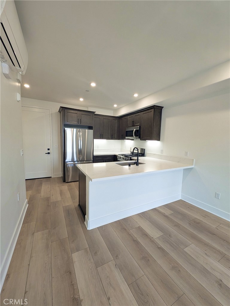 Brand new condominium living at the Palladium - #106 is a ground floor 1-bed, 1-bath unit with interior and exterior entry. All new premium appliances, A/C, no step shower, laundry inside unit, exclusive storage space, an elegant lobby to meet and greet or gather on the rooftop deck with an ocean view, no utilities included, small pet okay.