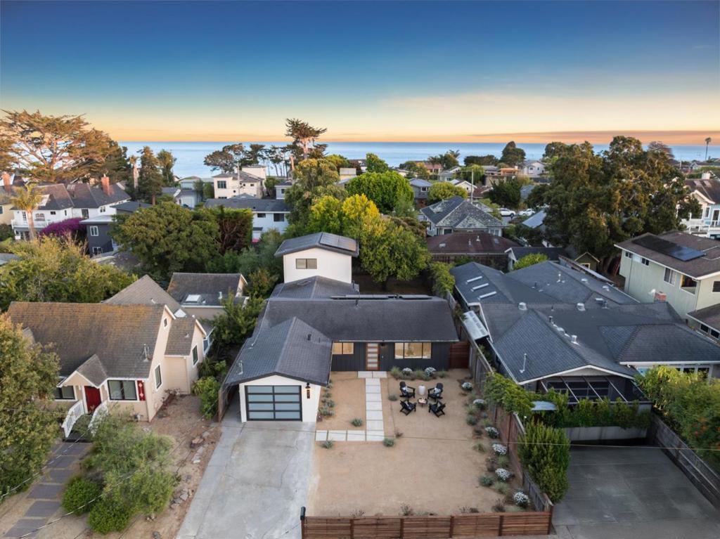 From San Diego to Canada, only a handful of Pacific coastline properties offer this level of extraordinary living. This completely redone Westside home sits where Natural Bridges State Beach and Wilder Ranch Preserve become your neighborhood playground; with world-class birdwatching just outside your door. High-end materials throughout, while your artfully landscaped front yard provides perfect people-watching. Office space handles work-from-home professionals seamlessly, while multiple living areas accommodate larger groups. The two-story permitted structure changes everything - workshop, office, or rental income that's been part of Santa Cruz's rental program for a decade. Separate entrances mean ultimate flexibility for whatever your life demands. A block and half from the Monterey Bay National Marine Sanctuary where pelicans travel in families, whales migrate past your morning coffee, and the Seymour Marine Discovery Center showcases UC research happening in your backyard. Your permanent foothold on the Westside places you on one of California's greatest coastal stretches. When you secure this rare combination of location, flexibility, and ocean access, you'll understand why properties like this simply don't come available.