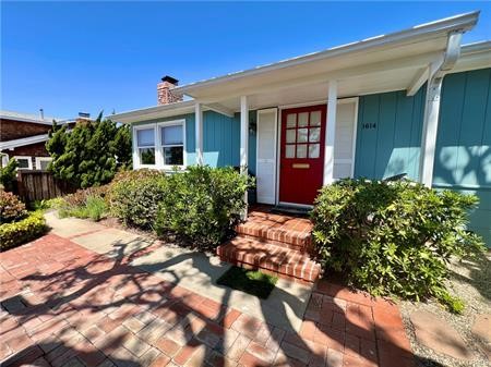 This furnished and turn key cottage is your private oasis in the desired North Laguna neighborhood. Two bedrooms, two baths, fireplace, hardwood floors, inside laundry, and front dutch doors opening out to a front porch and sitting area. The back doors open to a lush back yard that has been designed with a brick patios, multiple seating areas for relaxing or entertaining, mature fruit trees and a fenced yard. Three parking spaces in the concrete driveway.