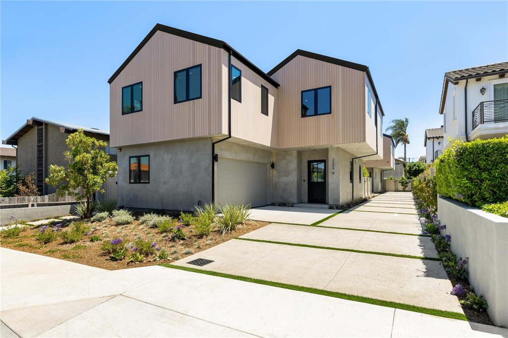 *Front & Back Unit Available - Garage Included in the SQFT* — Welcome to 2206 Gates Avenue, a stunning showcase of modern luxury on one of North Redondo Beach’s most prestigious streets. This custom residence is part of an exclusive new development featuring two detached townhomes—each sold individually—designed by world-renowned architect Hsu McCullough, as seen in Architectural Digest. Set on a large 7,501 sq. ft. lot, this home offers the privacy and feel of a single-family residence. Enter through a charming Dutch door into a light-filled, open-concept main level with a full-height limestone-veneered fireplace. Dual sliding glass doors open to a completely private backyard and patio, creating seamless indoor-outdoor flow. The chef’s kitchen features an oversized island with bar seating, a large farmhouse sink with Rohl faucet, custom Italian Cleaf cabinetry, Thermador appliances, six-burner range with hood vent, and premium Taj Mahal quartzite counters and backsplash. Large pantry, storage closet off the direct access garage, and a powder room add convenience. The main level also includes recessed lighting, built-in surround sound and "Alexa" controlled "smart home" features. The oversized two-car garage offers built-in storage and direct access to the home. Upstairs, a light oak staircase leads to the expansive primary suite with vaulted ceilings, exposed beams, fireplace, and a private balcony overlooking the yard. The spa-inspired ensuite features a freestanding soaking tub, double sink vanity, rainfall shower with skylight, private water closet, and a skylit walk-in closet with built-ins and a makeup vanity. Also upstairs: a laundry room with sink and storage, a bright junior suite with custom built-ins and ensuite bath, and two additional bedrooms with generous natural light and mountain views. A secondary upstairs bath includes a tub/shower combo and a private water closet. Additional features include solar panels, full home automation system (cameras, HVAC, lighting, music), high-efficiency HVAC with sleek linear vents, durable upcycled siding, and a metal roof for low-maintenance protection. The rear yard offers a serene space for al fresco dining, entertaining, or relaxing. 2206 Gates redefines luxury living through impeccable design, smart innovation, and elevated functionality—offering a rare opportunity to own a truly exceptional residence, and access to Mira Costa High School, in one of North Redondo Beach’s most desirable neighborhoods.